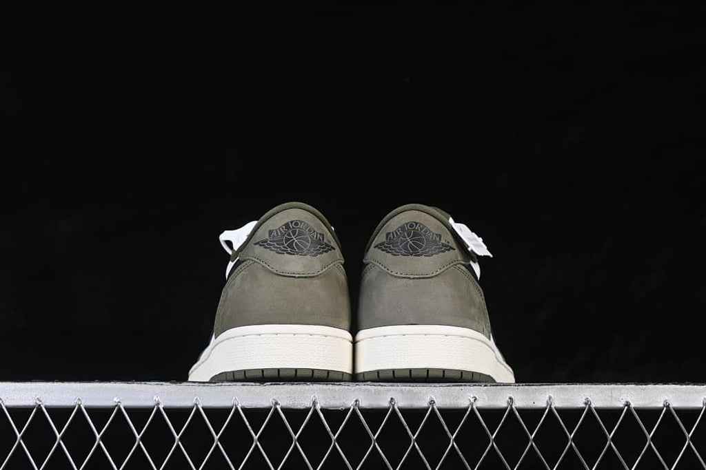 Rear view of both sneakers with olive heels and white midsoles
