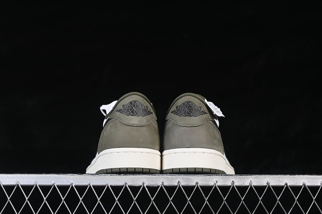 Rear view of both sneakers with olive heels and white midsoles