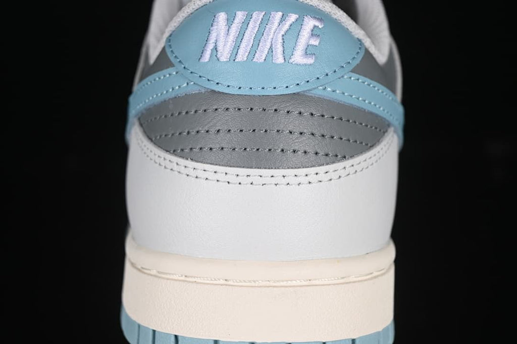 Rear heel detail with light blue panel and Nike embroidery