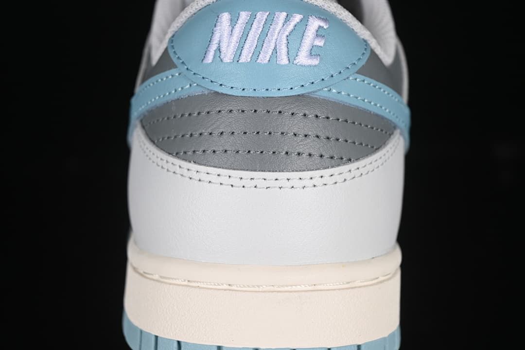 Rear heel detail with light blue panel and Nike embroidery