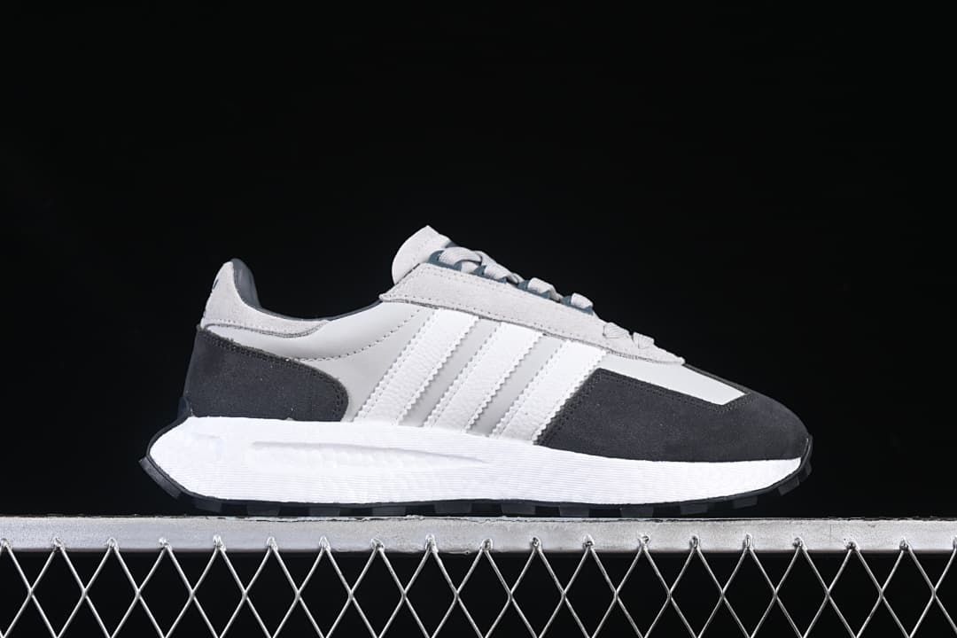 Side profile showing the layered upper and white midsole