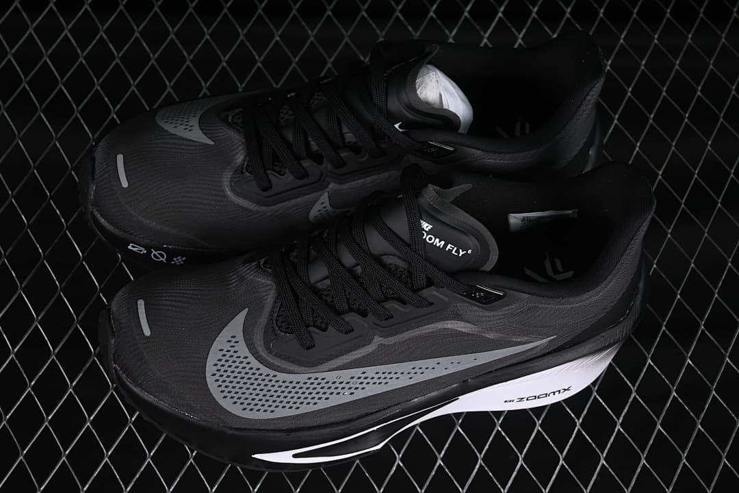 Pair of black and gray Nike Zoom Fly 6 running shoes shown from above