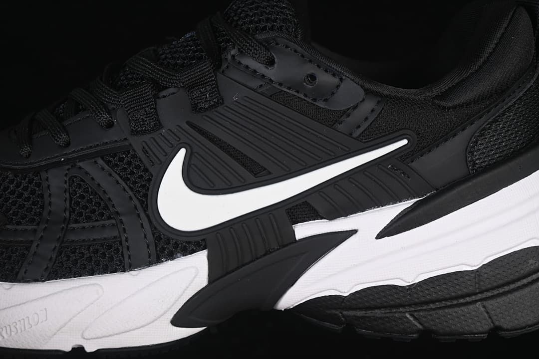 Close-up of the side Swoosh, mesh panels, and sculpted sole.