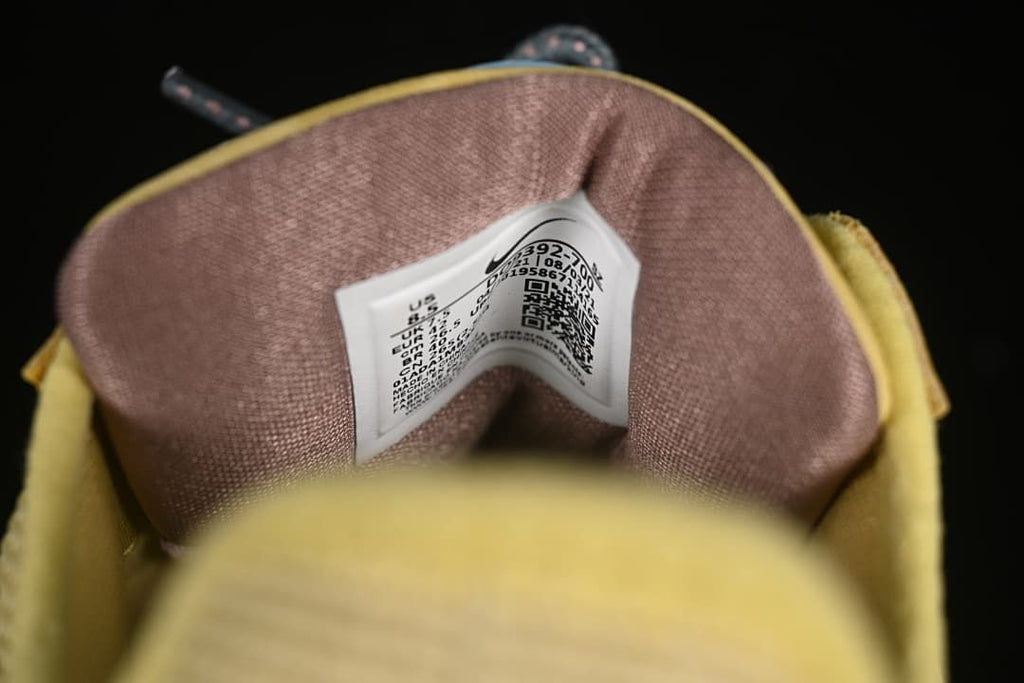 Close-up of the tongue label and brown-toned lining.