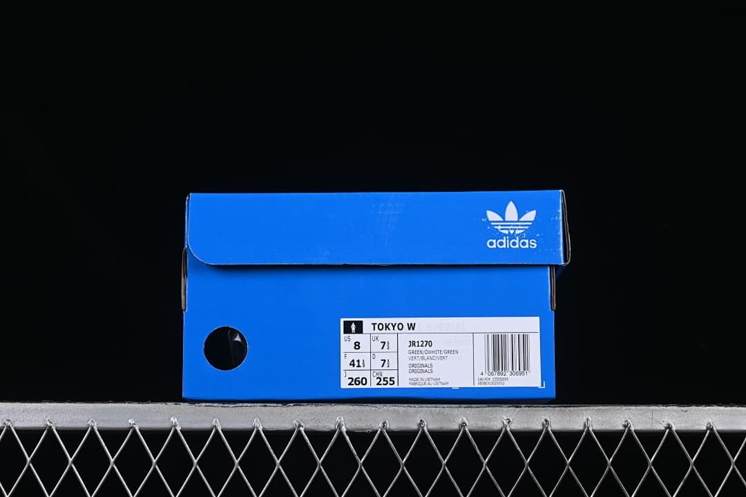 Blue adidas shoe box with a label identifying Tokyo W, model JR1270 and sample size US 8.