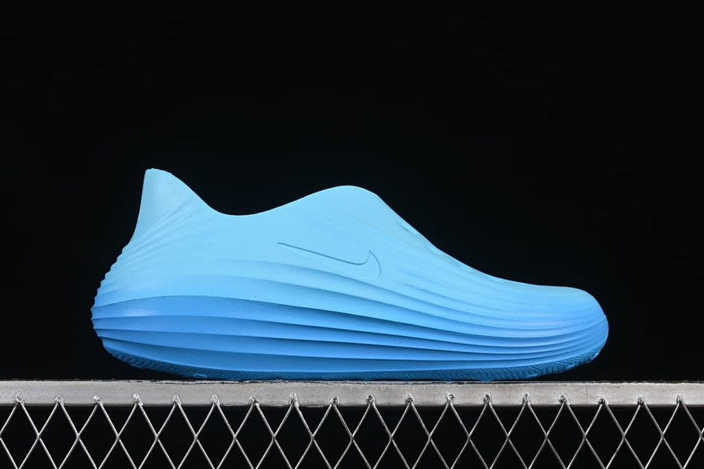 Side profile showing the sculpted sole and Swoosh detail