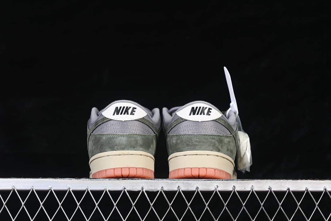 Rear view of both sneakers showing heel tabs and contrasting collar panels