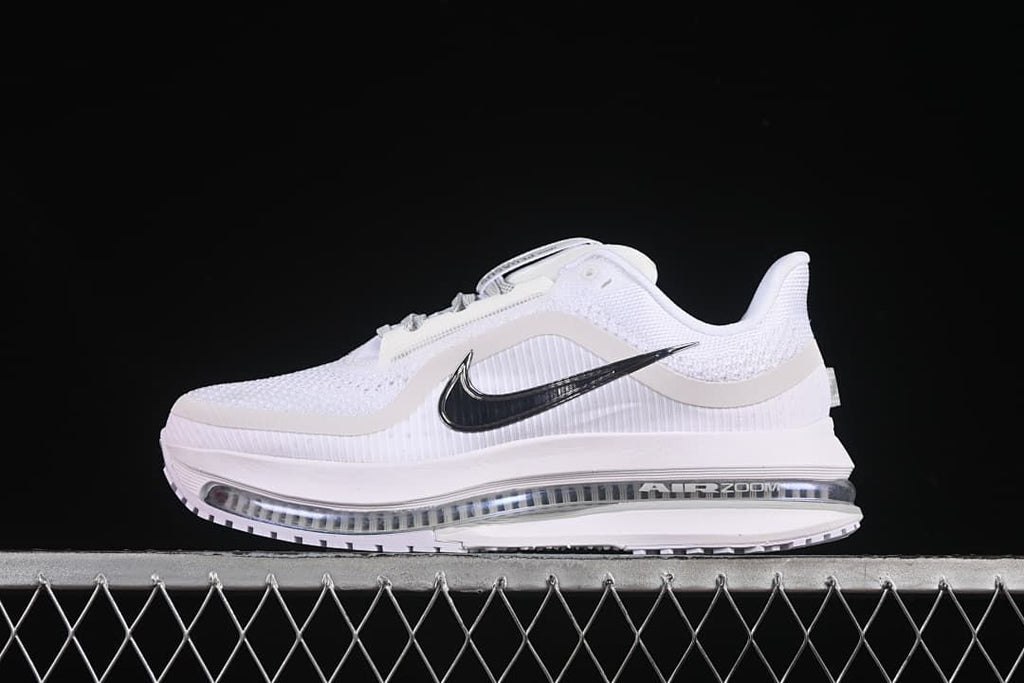 Side profile of a white Nike Air Zoom Pegasus Premium shoe with a visible cushioning unit.