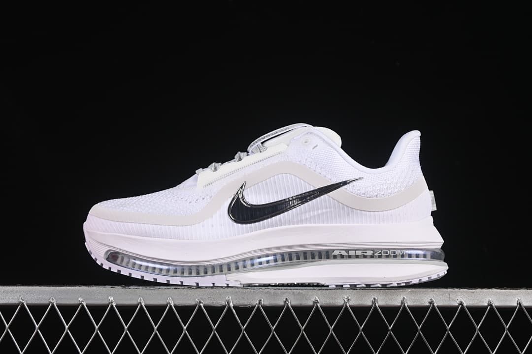 Side profile of a white Nike Air Zoom Pegasus Premium shoe with a visible cushioning unit.
