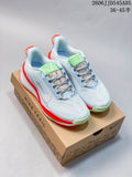 Pair of light blue Nike Pegasus Trail 6 shoes on a box, showing bright red-orange and pale green accents.