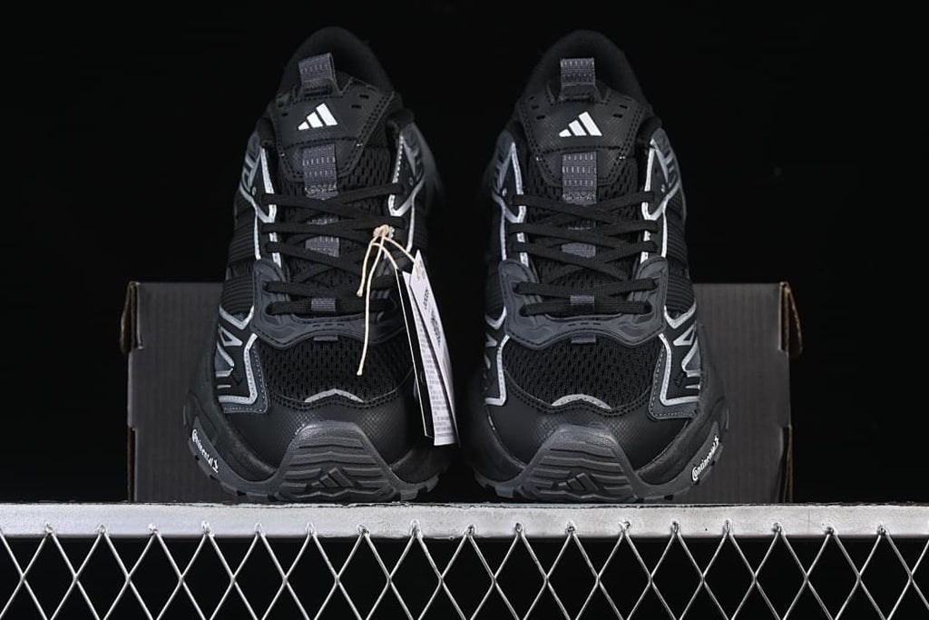 Front view of the pair showing the mesh toe and lace-up design