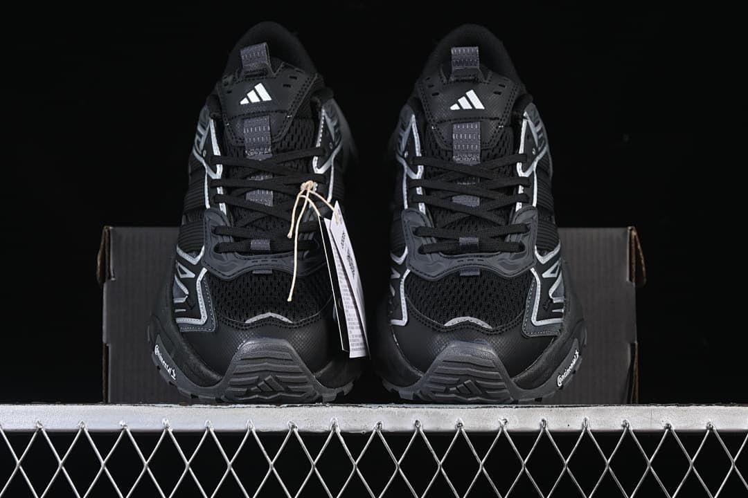 Front view of the pair showing the mesh toe and lace-up design