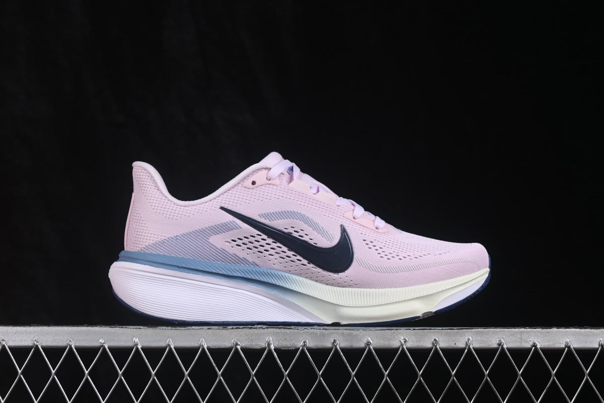 Side profile of a pale pink Nike Air Zoom Pegasus 42 sneaker with navy Swoosh and blue midsole accent.