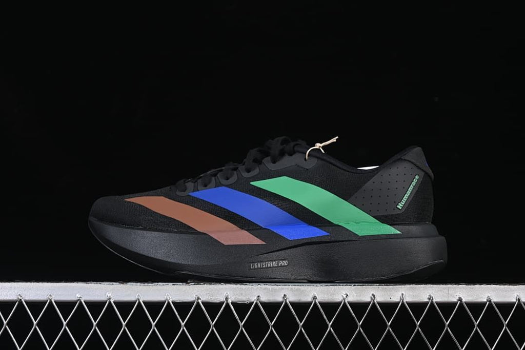 Side view of the black Adizero Evo SL shoe with colored accents.