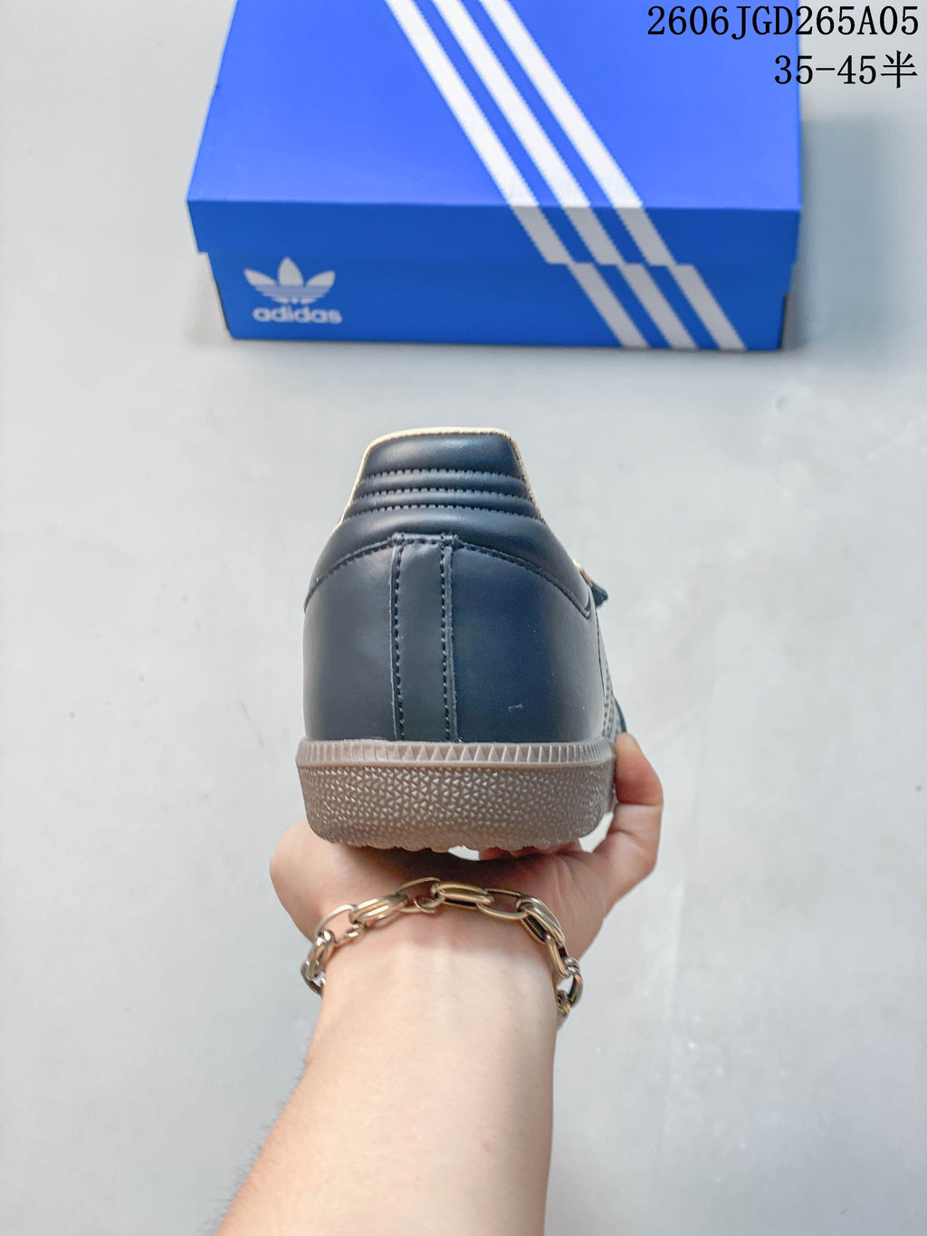 Rear view of an adidas Samba Jane sneaker showing its heel and gum-colored sole