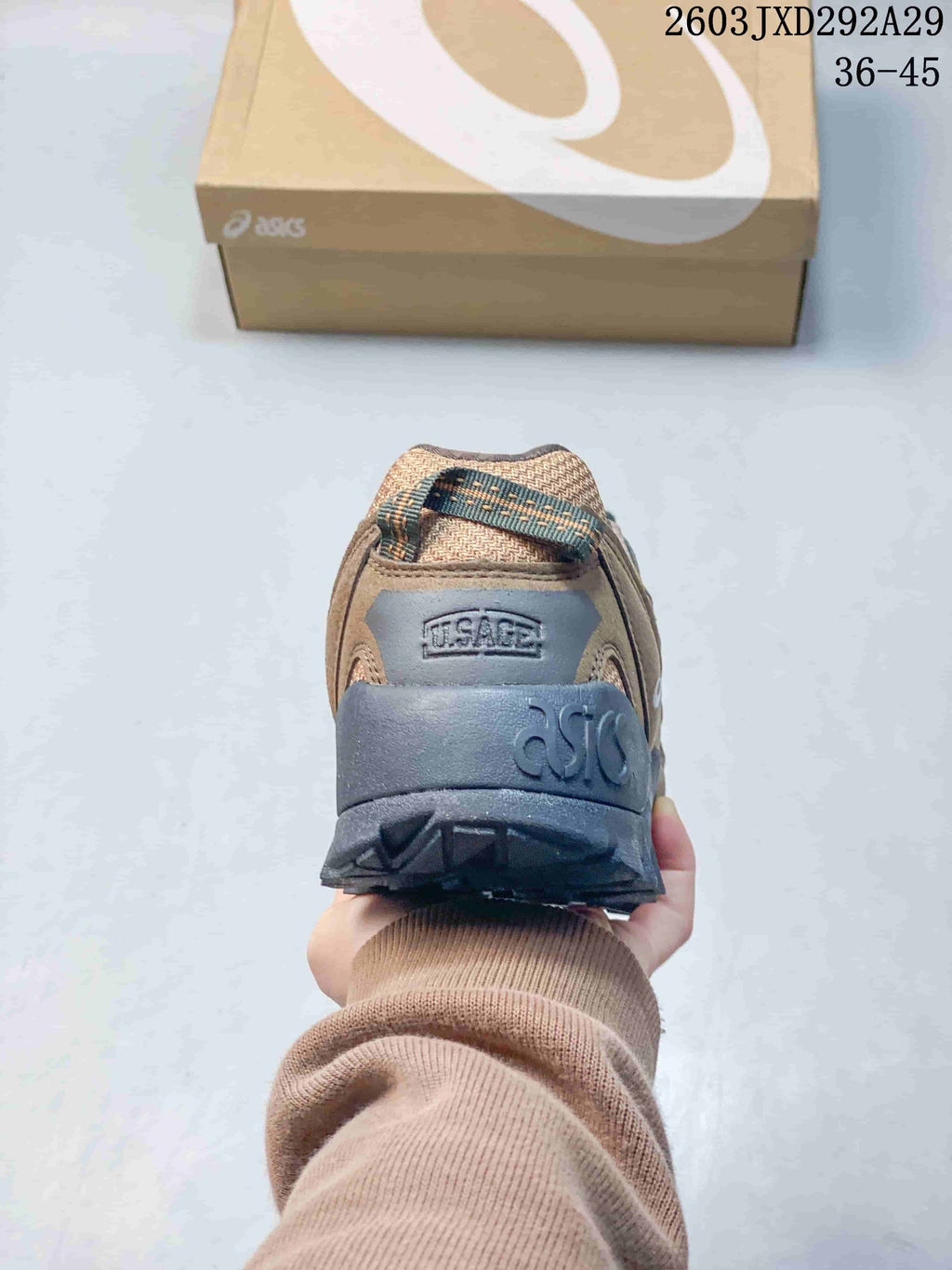 Rear view of an ASICS Gel-Pickax sneaker showing its heel and padded collar.