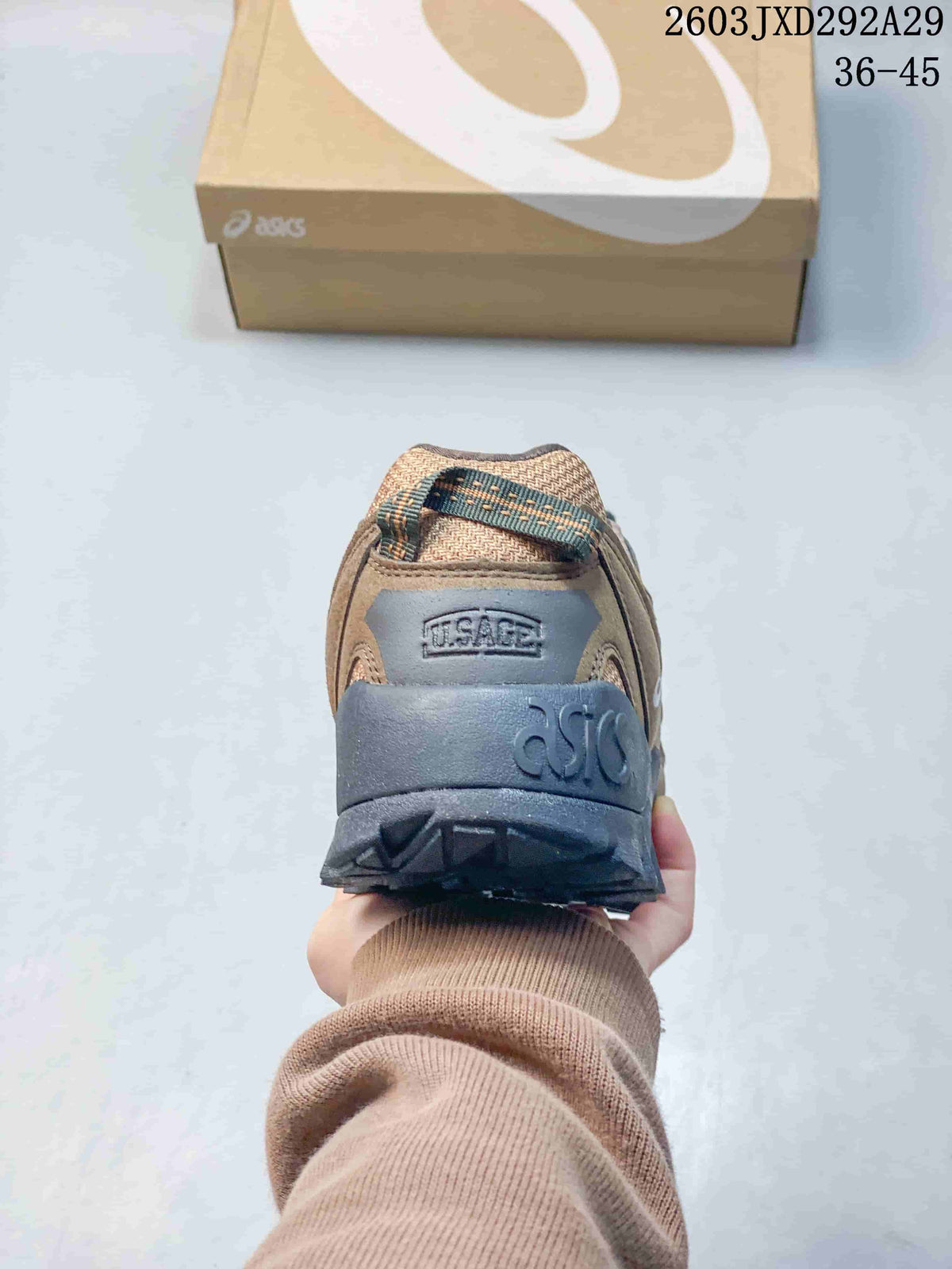Rear view of an ASICS Gel-Pickax sneaker showing its heel and padded collar.