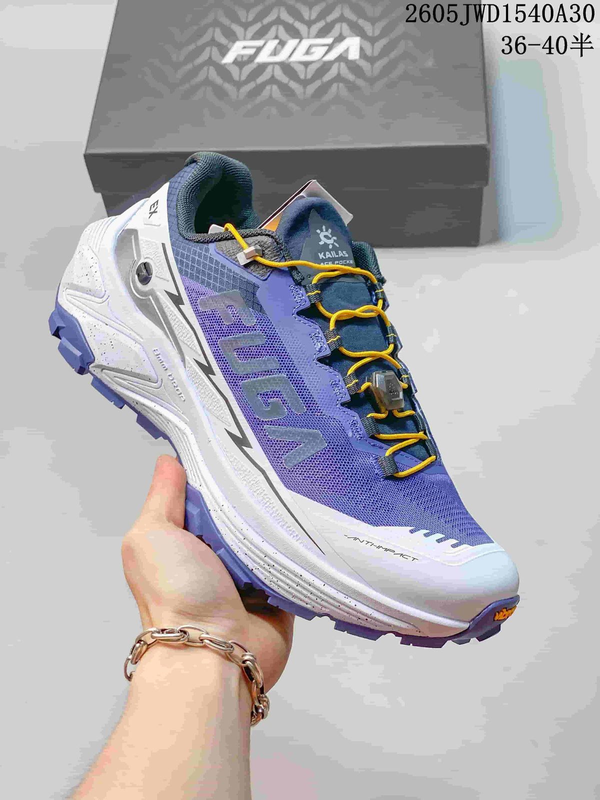 Angled view of the Kailas FUGA shoe with its lugged outsole and dial lacing.