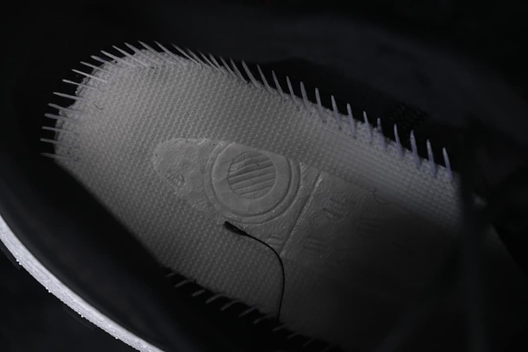 Close-up of the shoe outsole edge and tread detail.
