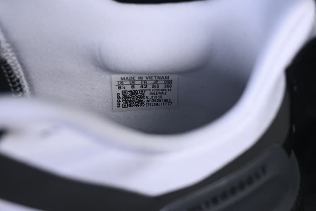 Shoe interior label showing product and size details