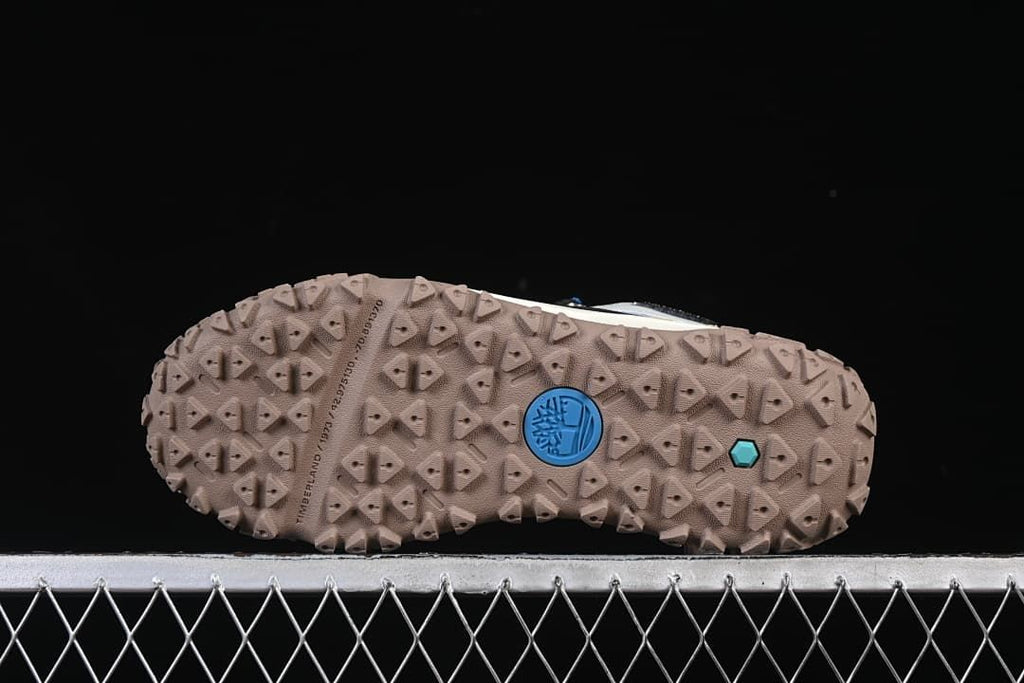 Underside view showing the patterned lug outsole