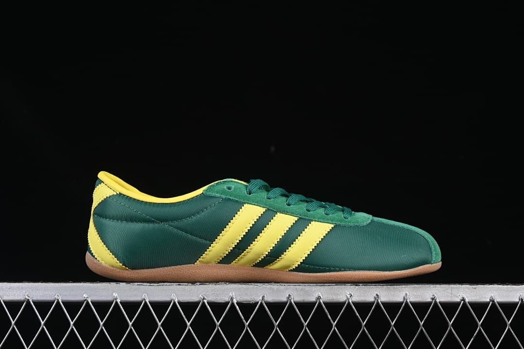 Outer side profile of the green and yellow sneaker