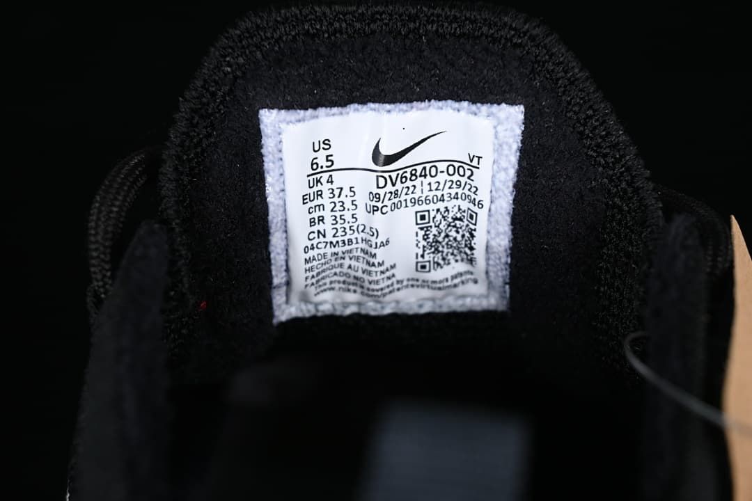 Close-up of the tongue size label showing sample size EU 37.5 and style code DV6840-002.