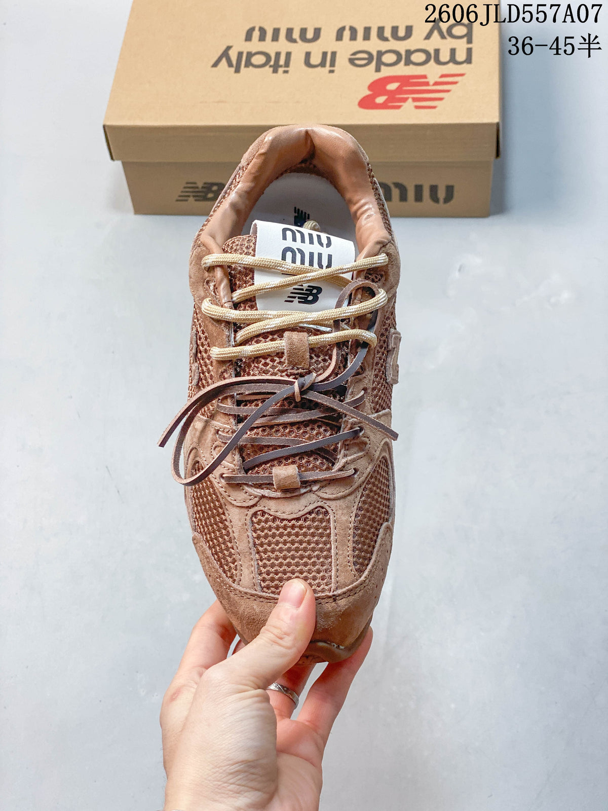 Top view of the sneaker showing its layered panels and contrasting laces.
