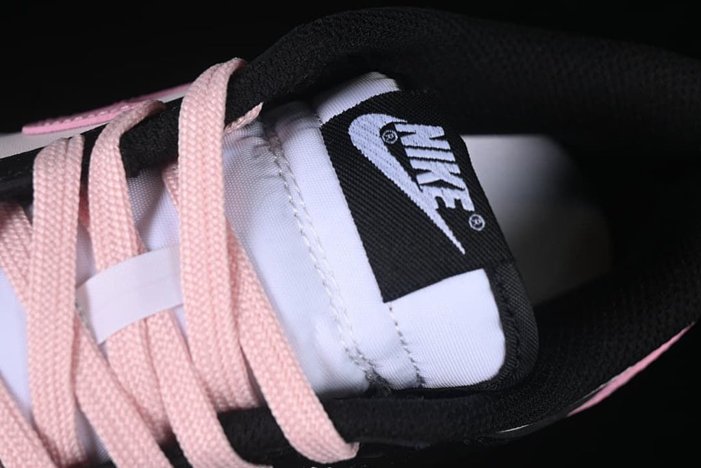 Close-up of the tongue label and pink laces