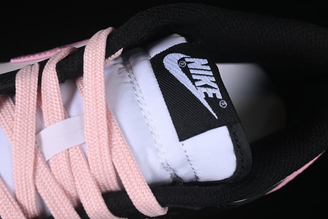 Close-up of the tongue label and pink laces