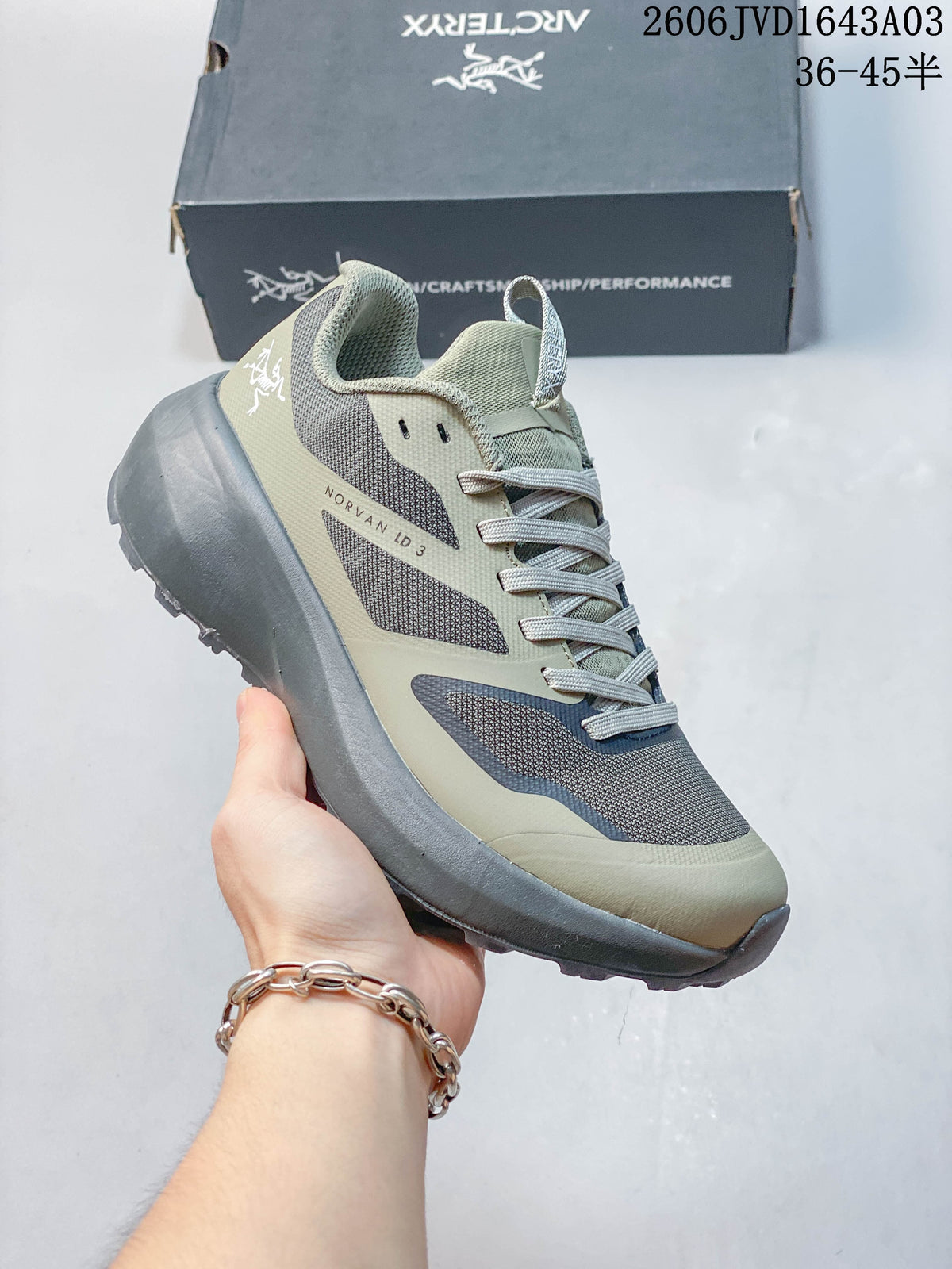 Sage and gray Norvan LD 3 shoe shown from the side