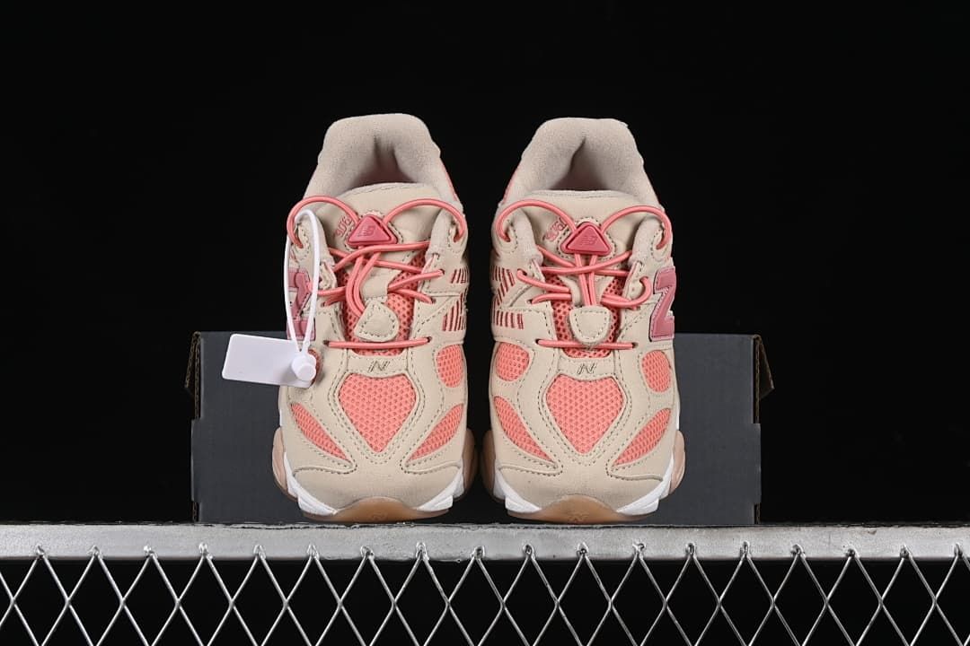 Front view of the pair of kids' sneakers