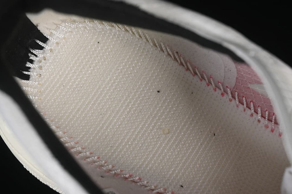 Close-up of the shoe interior and stitched lining