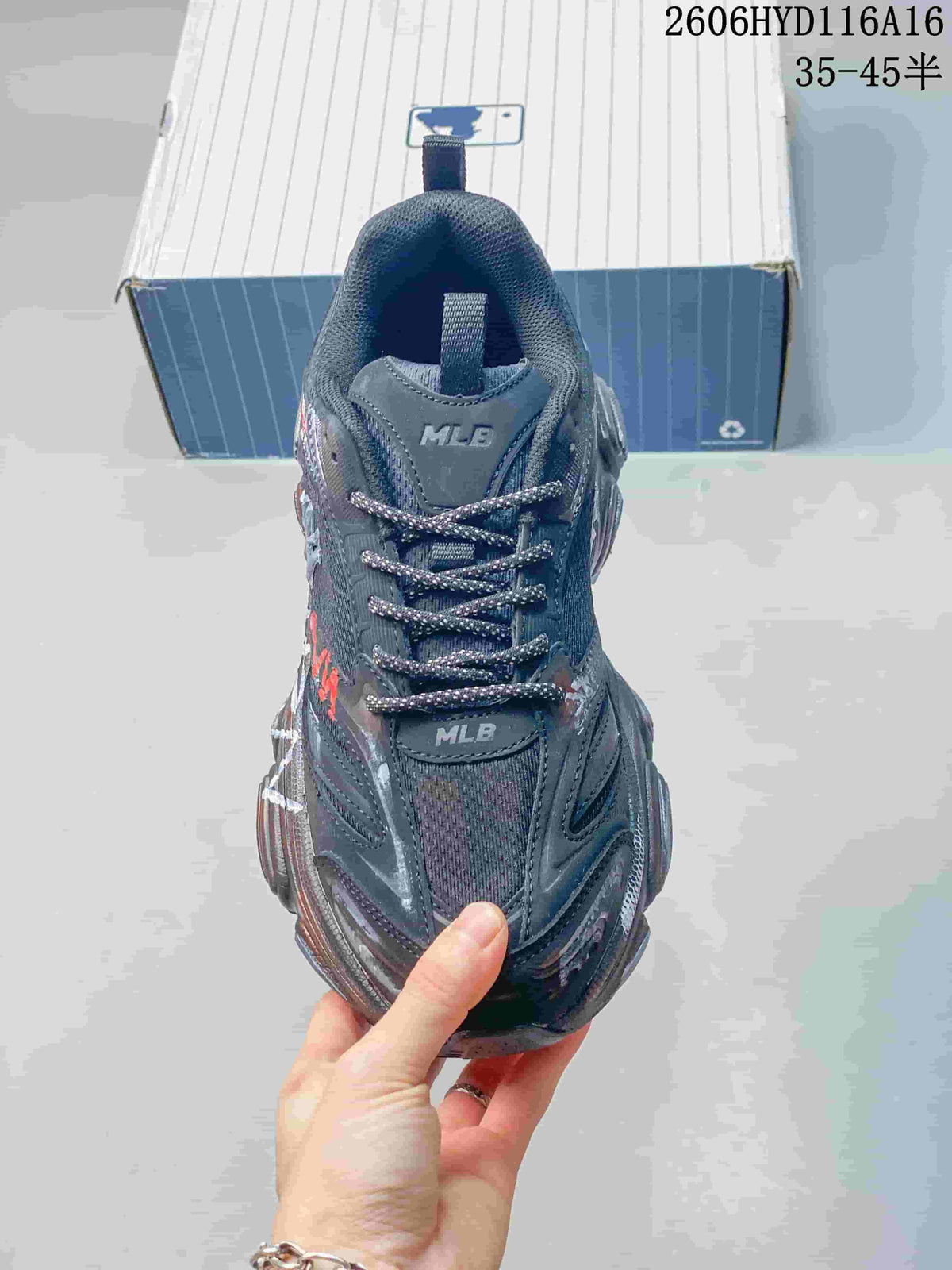 Front view of a charcoal lace-up sneaker with MLB lettering