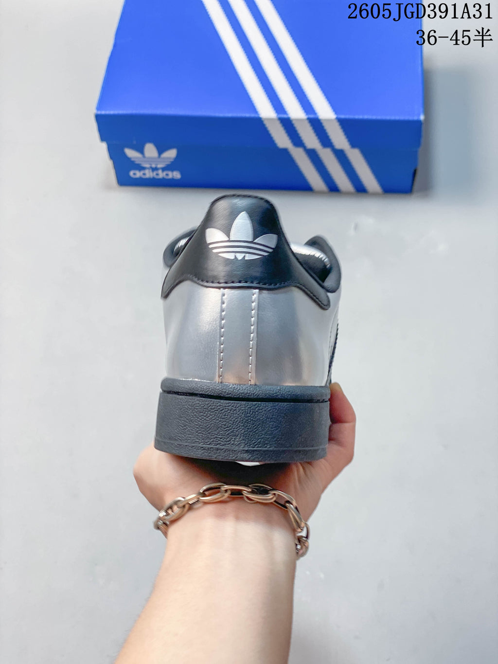 Rear view showing the silver heel and dark heel tab.