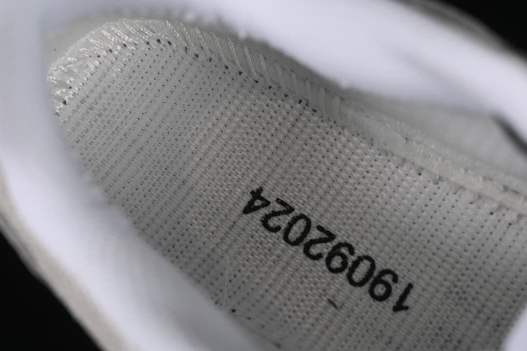 Close-up of the sneaker's inner lining and printed code