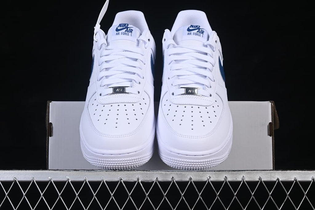 Front view of the white Nike Air Force 1 ’07 Low pair