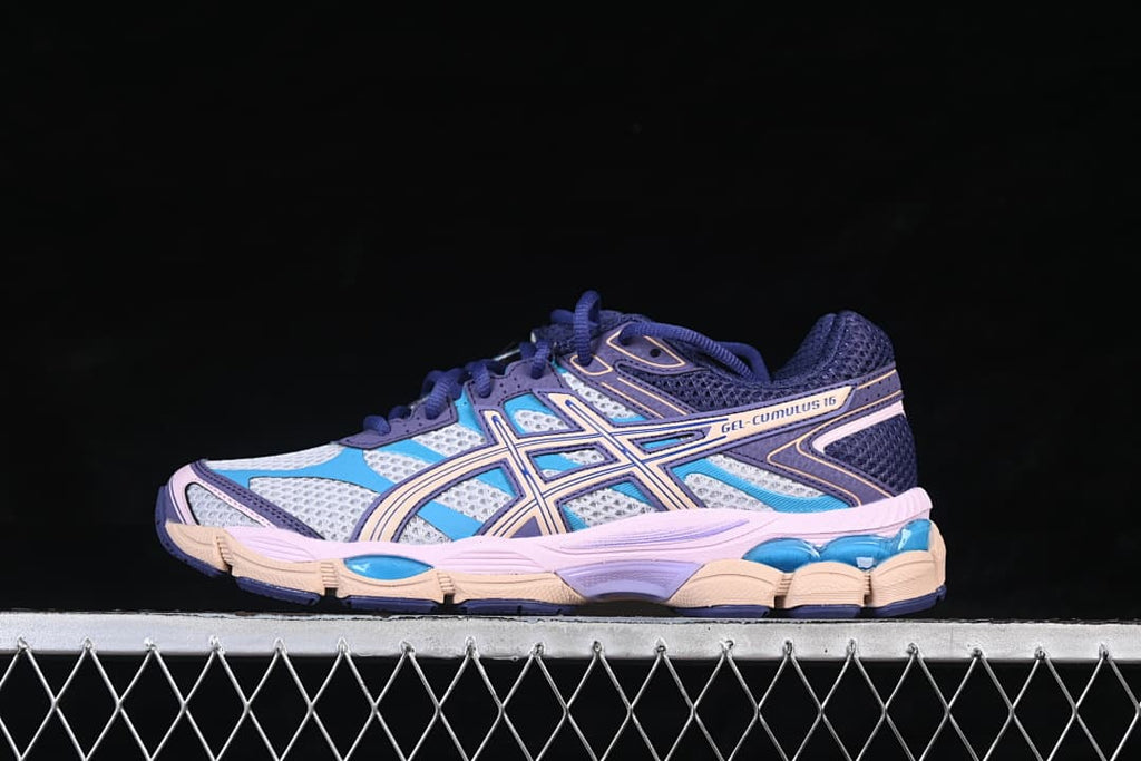 Side view of ASICS GEL-CUMULUS 16 sneakers in navy, grey, blue, pink and beige.