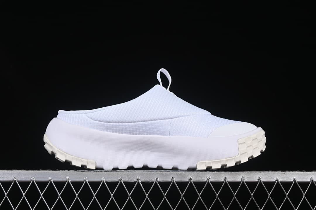 Side view highlighting the chunky lugged outsole