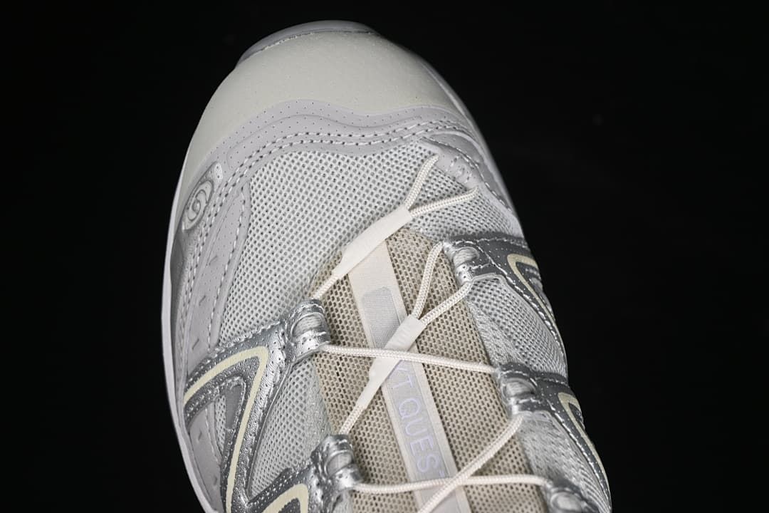 Top-front close-up showing the mesh-like upper and laces.