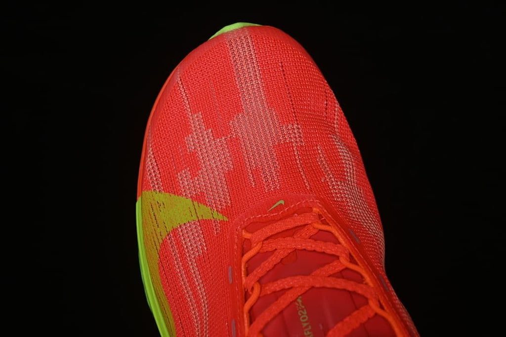 Top-down close-up of the patterned toe and laces.