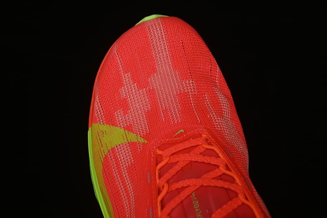 Top-down close-up of the patterned toe and laces.