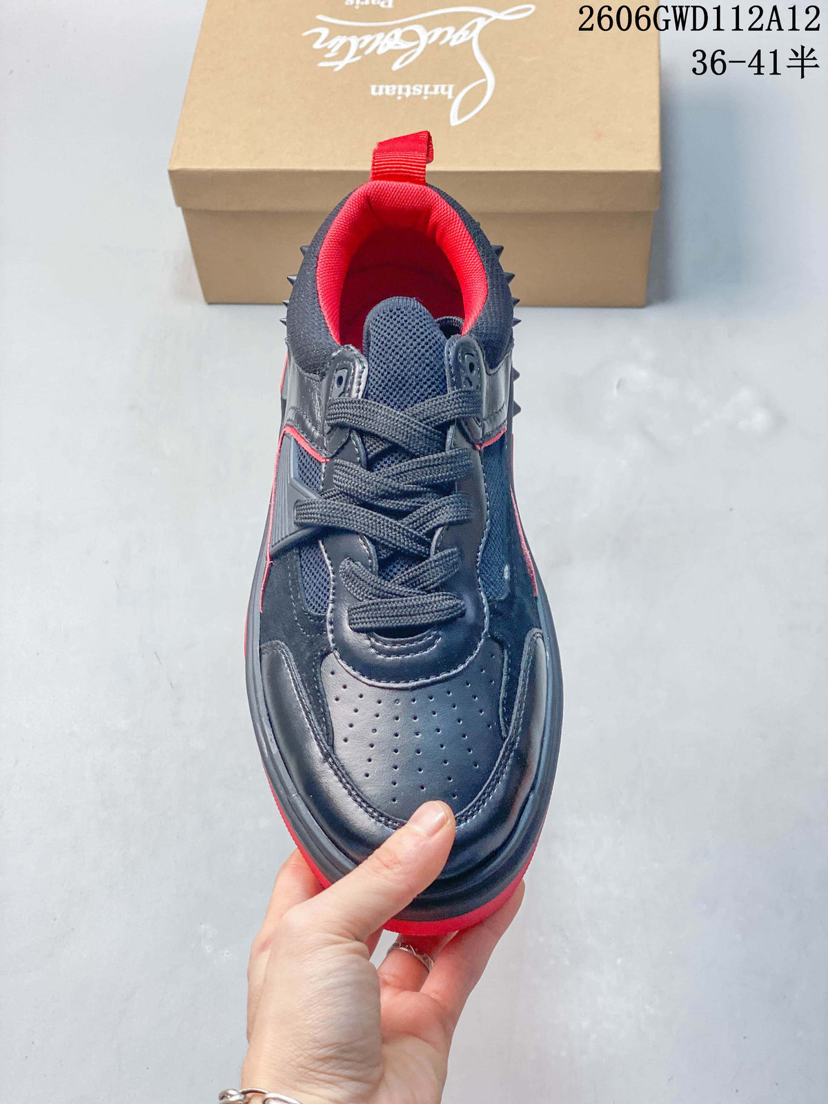 Top view showing the laces, perforated toe and red lining