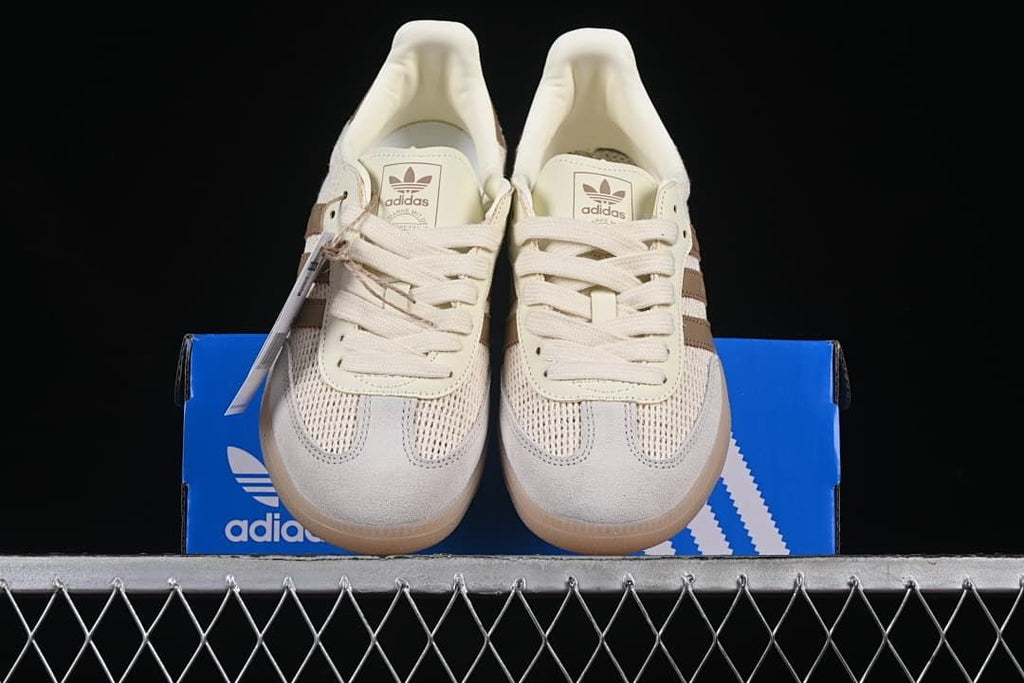 Front view of the pair showing the toe panels and laces