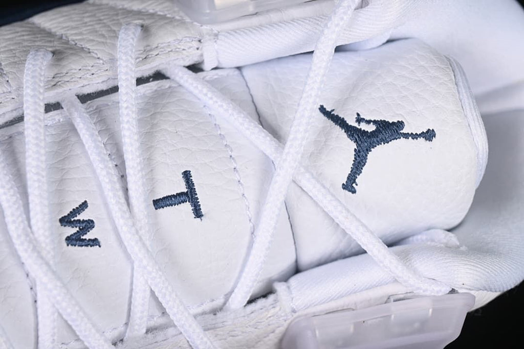 Close-up of laces, tongue branding, and side lace hardware
