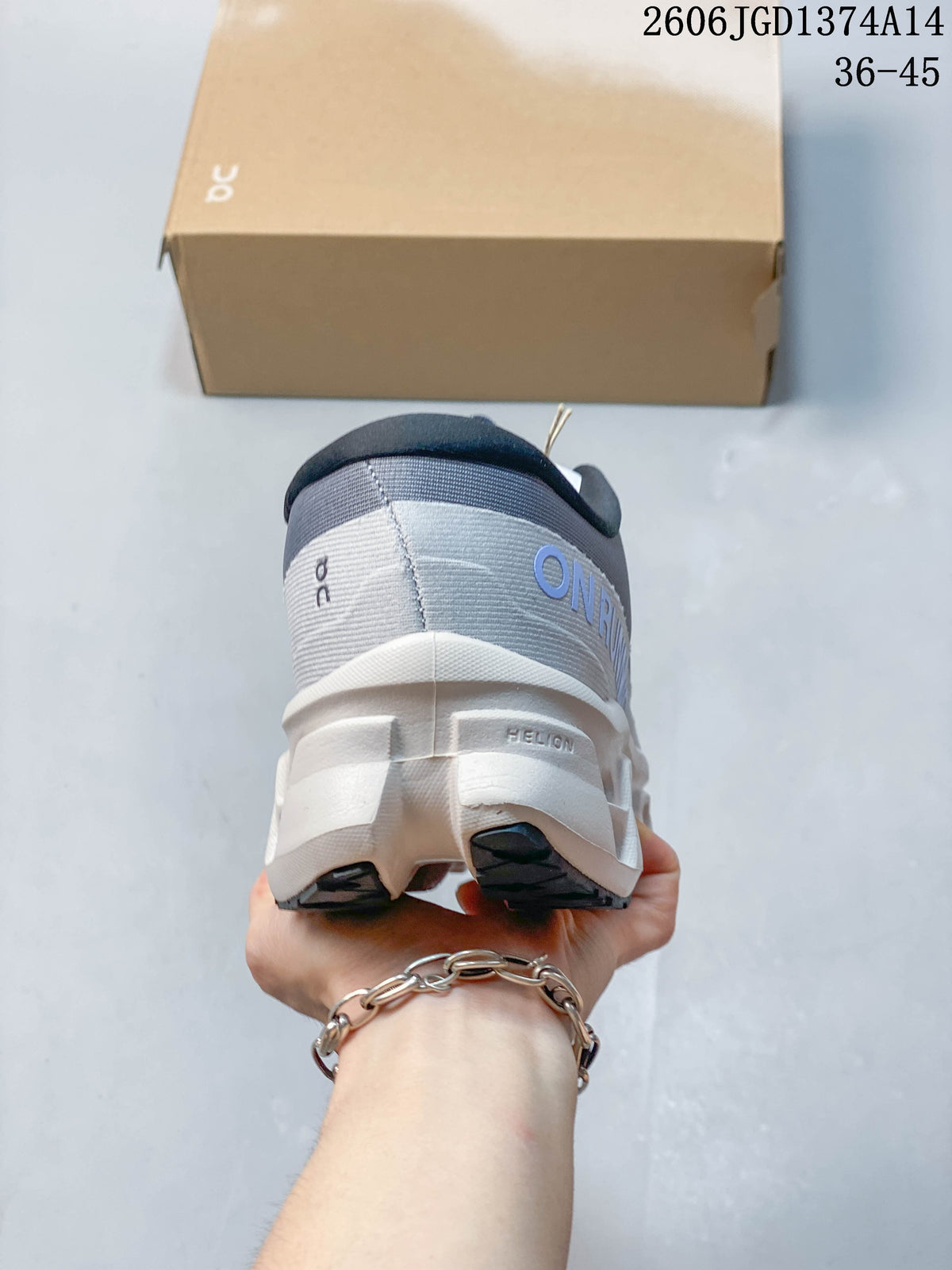 Rear view showing the heel, branding and sculpted white midsole.
