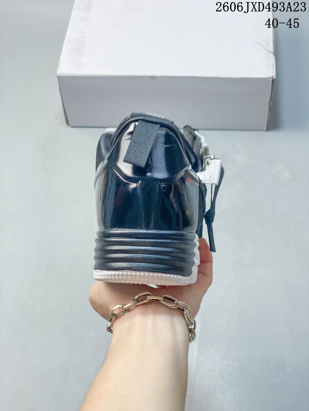 Rear view showing the dark heel panel and layered sole.