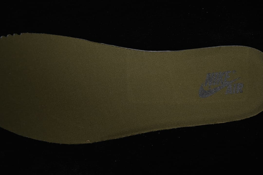 Close-up view of the olive-colored insole with Nike Air branding