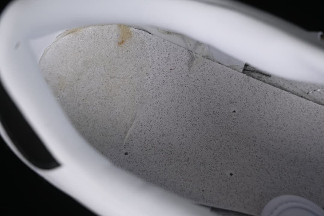 Close-up view inside the shoe showing the lining and construction.