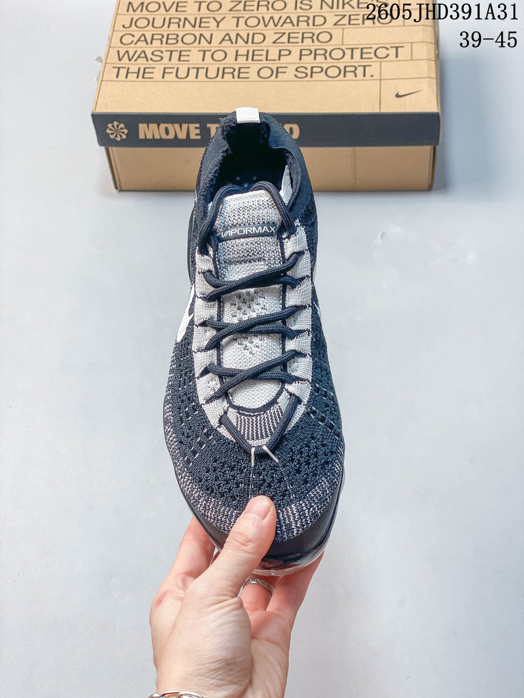 Top view showing the laces, tongue label, and knit-patterned upper